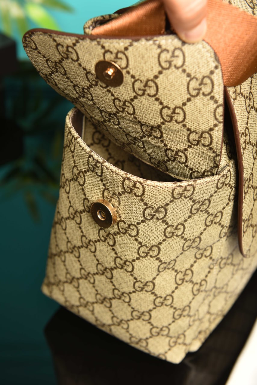 '- Plus Diaper Bag