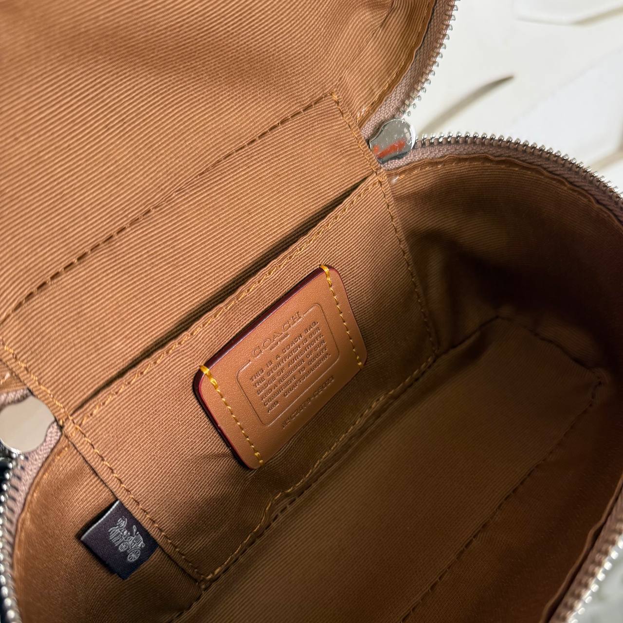 '-Mini Rainer 18 Crossbody Bag